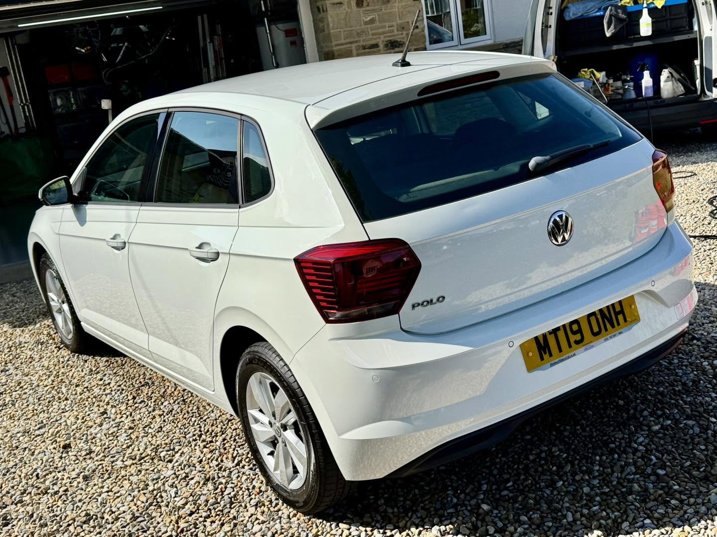 White Volkswagen Polo after a full valet