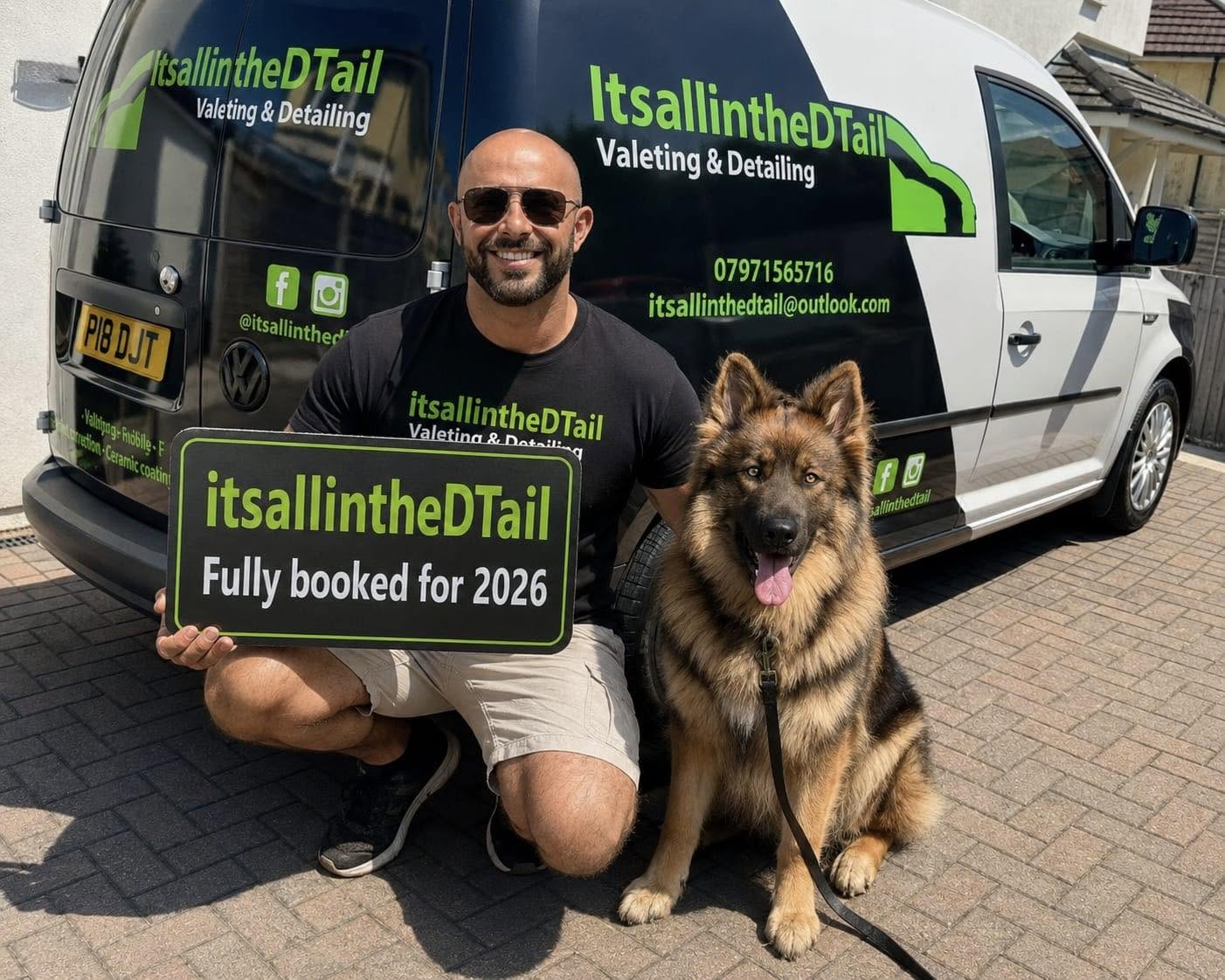 Danny, founder of Itsallinthedtail, with his dog beside the company van