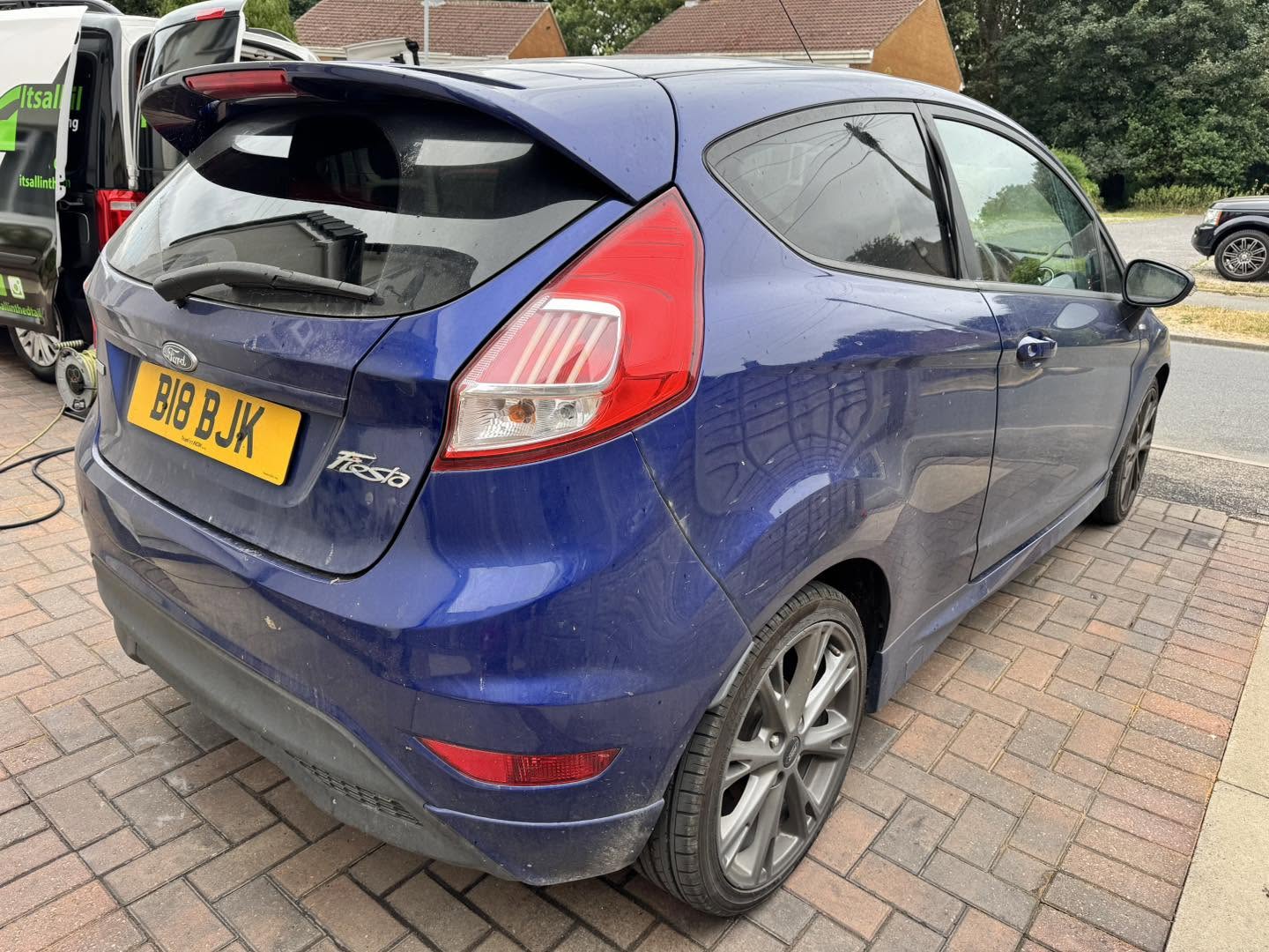 Blue Ford Fiesta exterior — before